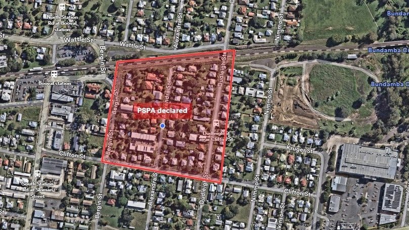 The car collided with another vehicle about 11.30am in Booval before striking the gas main, police say.