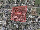 The car collided with another vehicle about 11.30am in Booval before striking the gas main, police say.