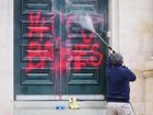 News. Graffiti on front doors of Parliament House in West Perth.