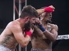 Reggie Barnett, right, takes a punch from Travis Thompson during a 135-pound bout at the Bare Knuckle Fighting Championship at the Ice and Events Center in 2018.