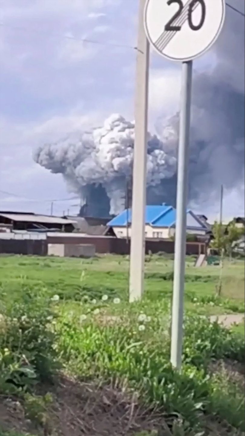 Smoke rises above the area following a Ukrainian drone attack in the Usolsky district of the Irkutsk region of Russia, in this still image from a video published June 1, 2025.