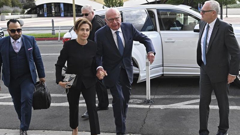 Rupert Murdoch attends court with his fifth wife Elena Zhukova.  
