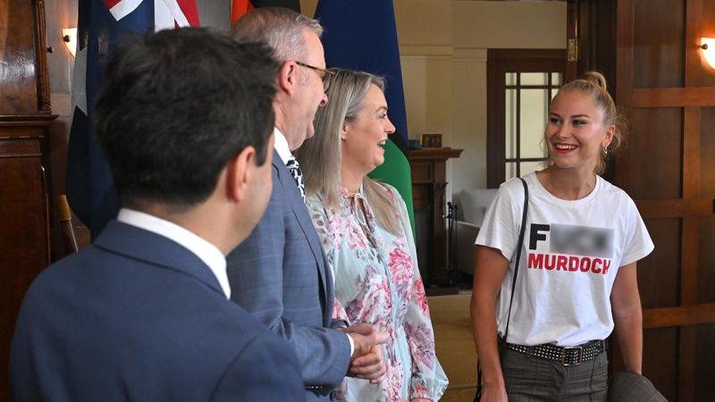 Grace Tame caused a stir when she wore a provocative t-shirt to greet the Prime Minister at an Australian of the Year event.
