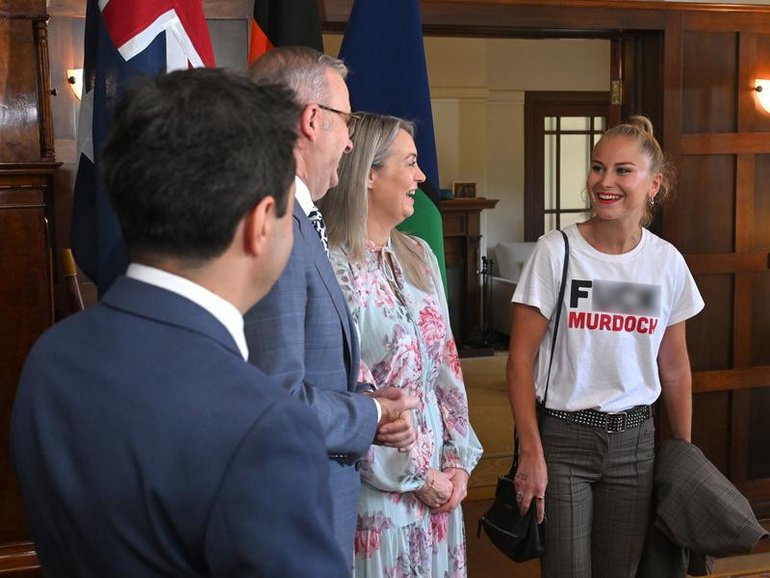 Grace Tame caused a stir when she wore a provocative t-shirt to greet the Prime Minister at an Australian of the Year event.