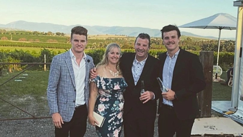 Bayley Fritsch (left) with his mother and father, and Darcy (right).