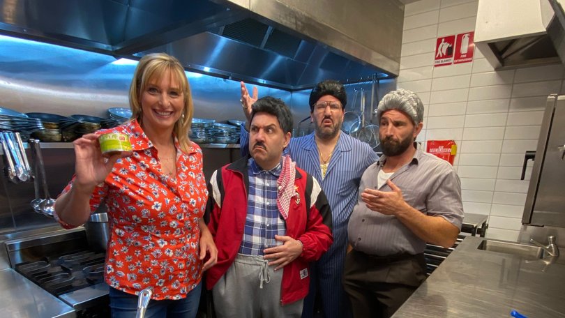 Johanna Griggs with the dads in the kitchen.
