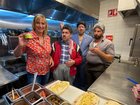 Johanna Griggs with the dads in the kitchen.  