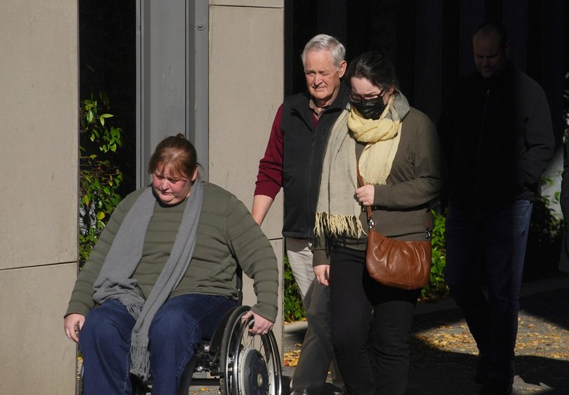 Ian Wilkinson and his family are seen outside the Latrobe Valley Magistrates Court during a lunch recess in Morwell, Victoria. Picture: NewsWire / Luis Enrique Ascui Picture: Luis Ascui Newswire
