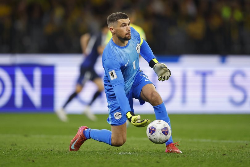 PERTH, AUSTRALIA - JUNE 05: Mathew Ryan of the Socceroos rolls the ball into play during the 2026 FIFA World Cup Round Three AFC Asian Qualifier match between Australia Socceroos and Japan at Optus Stadium on June 05, 2025 in Perth, Australia. (Photo by James Worsfold/Getty Images)
