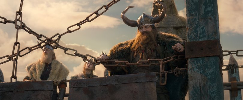 Gerard Butler reprises his voice role from the animated series as Hiccup’s father, Stoick the Vast.