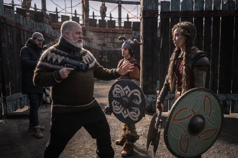 Dean DeBlois on the set of How to Train Your Dragon in live-action with Nico Parker.