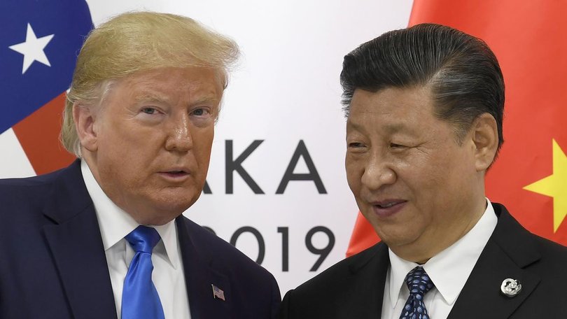 US President Donald Trump and Chinese leader Xi Jinping have agreed to fresh talks as tensions over tariffs and rare earth minerals threaten global markets. (AP PHOTO)