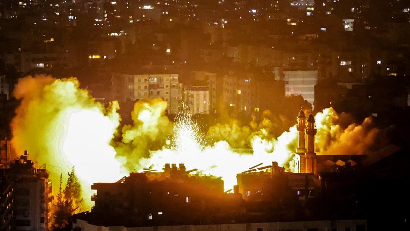 Smoke and fire errupt from the site of an Israeli airstrike on Beirutâs southern suburbs.