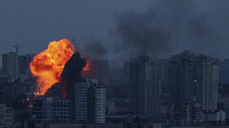Russian drone and missile strikes have killed four people in Kyiv, officials say. (AP PHOTO)