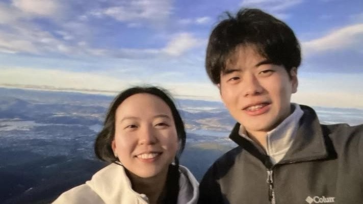 Two bodies, believed to be those of two Queensland tourists who went missing in North Hobart three days ago, have been found near a crashed vehicle in Tasmania’s northeast.