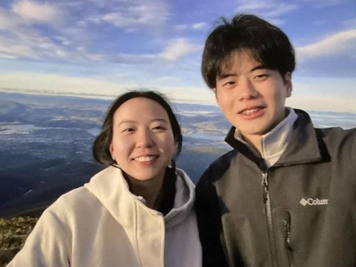 Two bodies, believed to be those of two Queensland tourists who went missing in North Hobart three days ago, have been found near a crashed vehicle in Tasmania’s northeast.