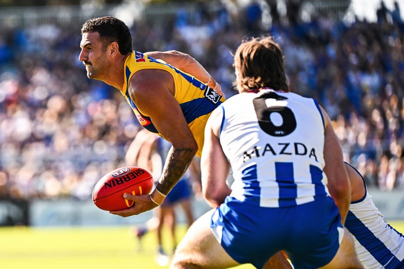 BUNBURY, AUSTRALIA - JUNE 08: Jack Graham of the Eagles handpasses the ball during the 2025 AFL Round 13 match between the North Melbourne Kangaroos v West Coast Eagles at Hands Oval on June 8, 2025 in Bunbury, Australia. (Photo by Daniel Carson/AFL Photos)