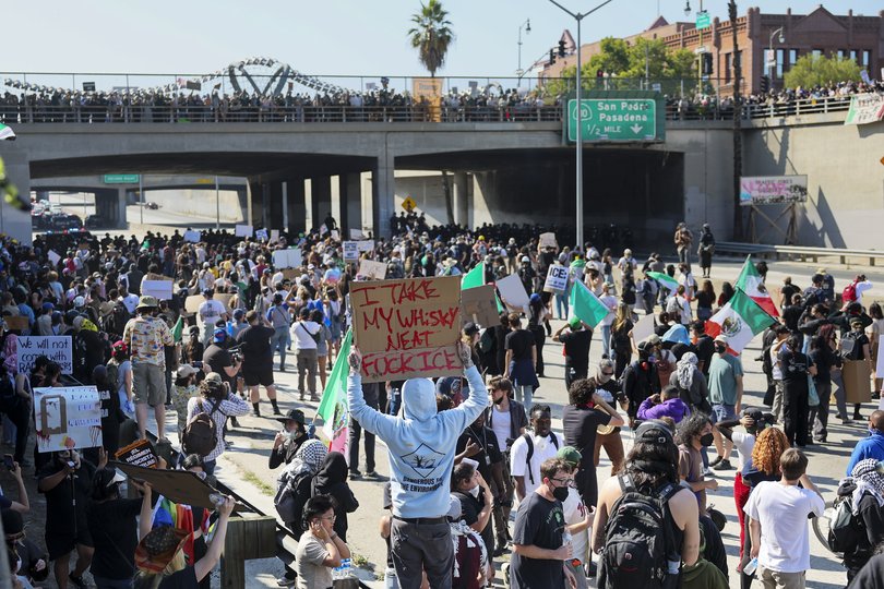 Activists protest immigration raids, stopping traffic on the 101 freeway near the Edward R. Roybal Federal Building in Los Angeles, California, USA, 08 June 2025.