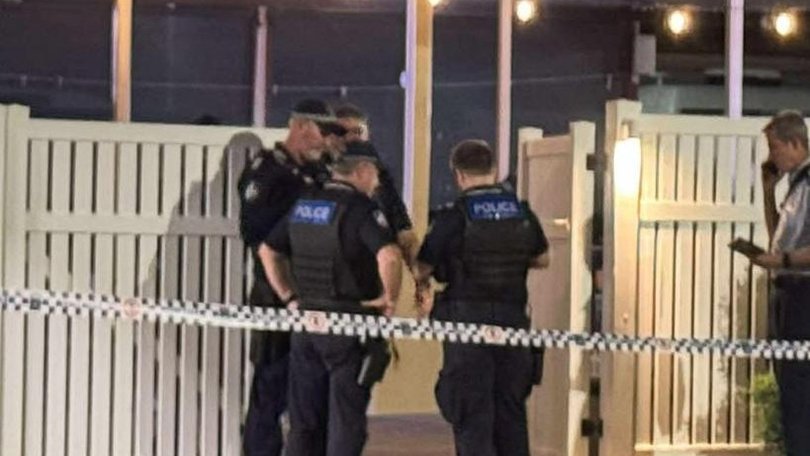A woman allegedly armed with a knife was shot by police at a pub in Townsville.