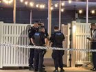 A woman allegedly armed with a knife was shot by police at a pub in Townsville. 