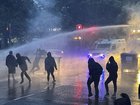 Violence erupted after a peaceful march to support a sexual assault victim.