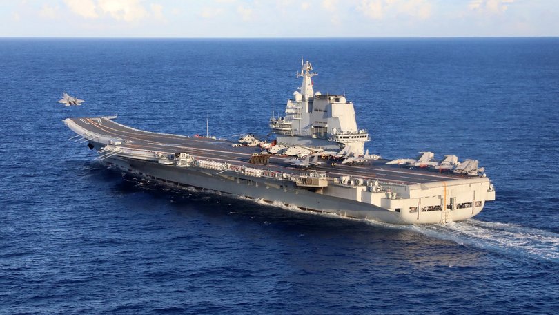 A J-15 takes off from Chinese aircraft carrier Liaoning in a photo released by the People's Liberation Army Navy.