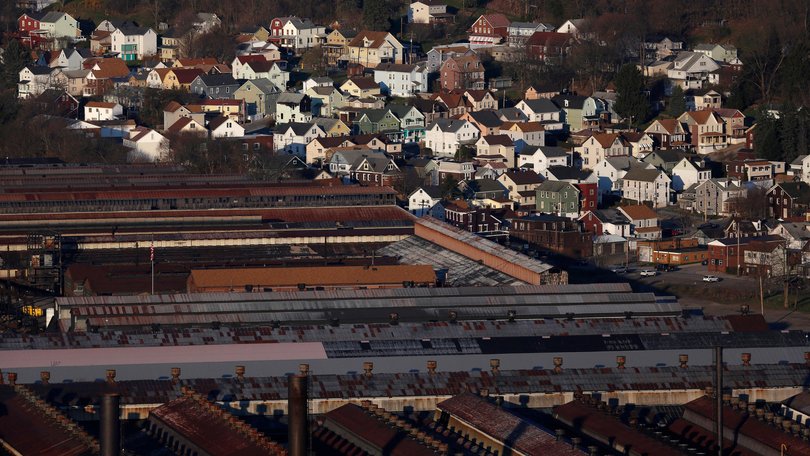 Houses stand near part of the former Bethlehem Steel Corp. plant, now occupied by Gautier Steel Ltd., in downtown Johnstown, Pennsylvania, US.