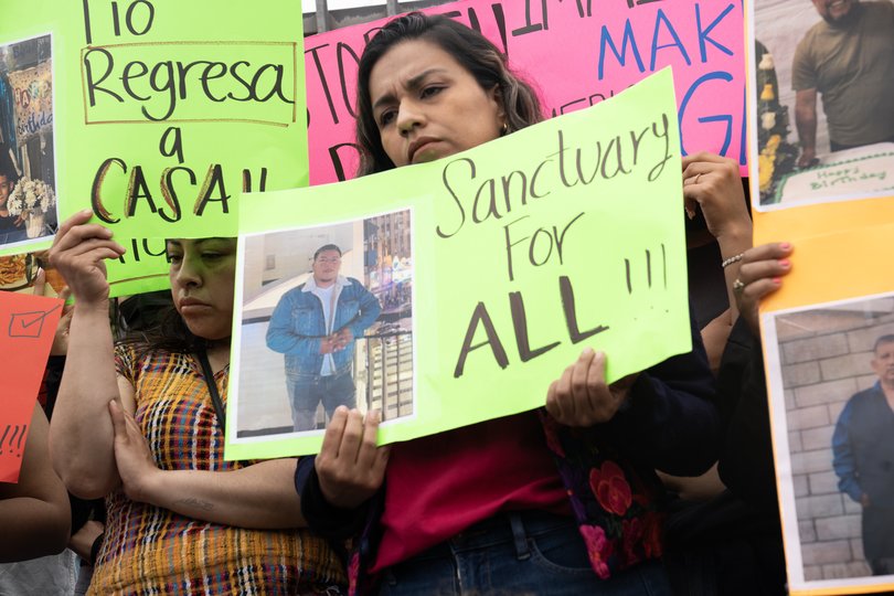 Families of detained workers hold a news conference in front of a Ambiance Apparel warehouse in Los Angeles on June 9. MUST CREDIT: Karla Gachet/For The Washington Post