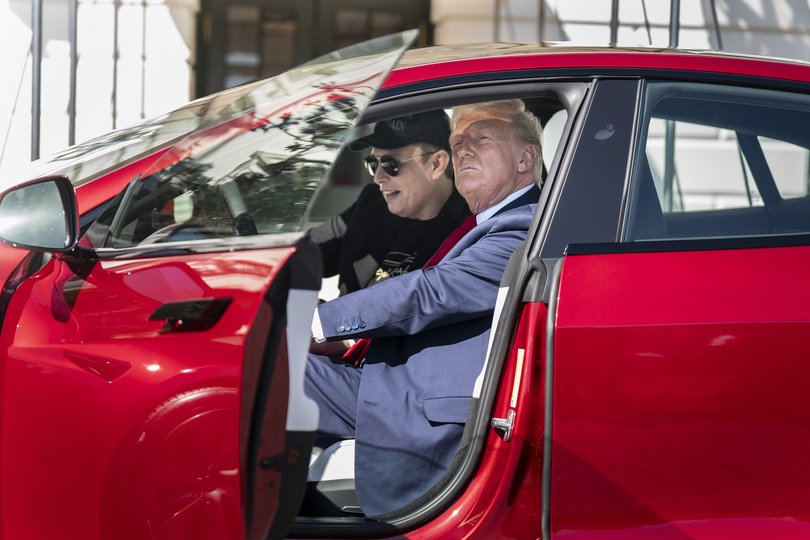 Trump and Musk get into a Tesla Model S while looking at various models of Teslas on the South Lawn at the White House on March 11. MUST CREDIT: Jabin Botsford/The Washington Post
