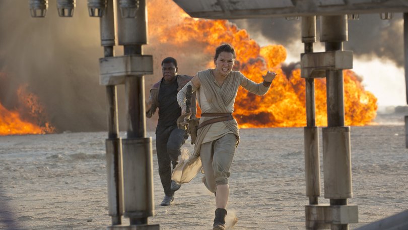Daisy Ridley, right, as Rey, and John Boyega as Finn, in a scene from the film, "Star Wars: The Force Awakens," directed by J.J. Abrams.