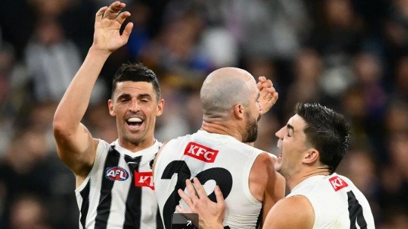 Scott Pendlebury, Steele Sidebottom and Bryaden Maynard during the win over the Bulldogs in March..