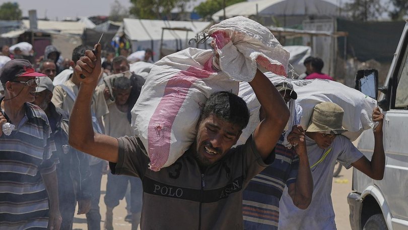 The UN resolution ‘strongly condemns’ the unlawful denial of humanitarian access to Gaza. (AP PHOTO)