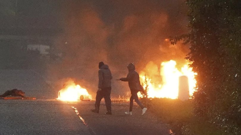 Rioters in Portadown hurled petrol bombs as anti-immigration protests in Northern Ireland continue. (AP PHOTO)