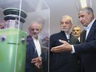 President Masoud Pezeshkian, second right, listens to Head of the Atomic Energy Organization of Iran Mohammad Eslami as he visits an exhibition of Iran's nuclear achievements in Tehran in April. (Iranian Presidency Office via AP)