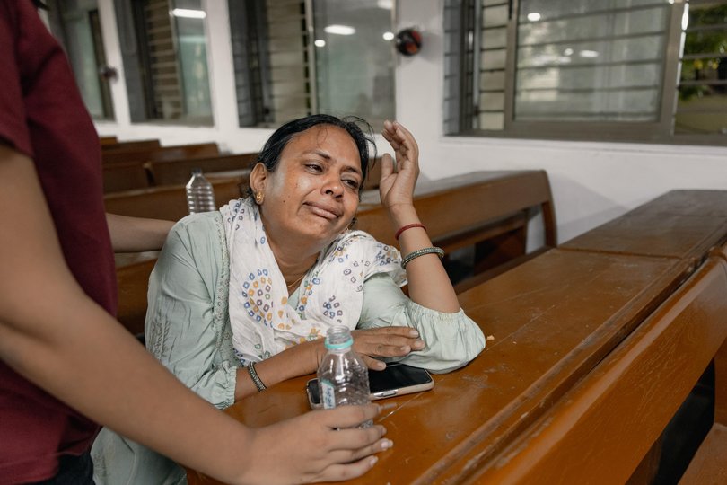 A woman who lost her parents onboard the doomed Air India flight that crashed soon after take off mourns in Ahmedabad, India.