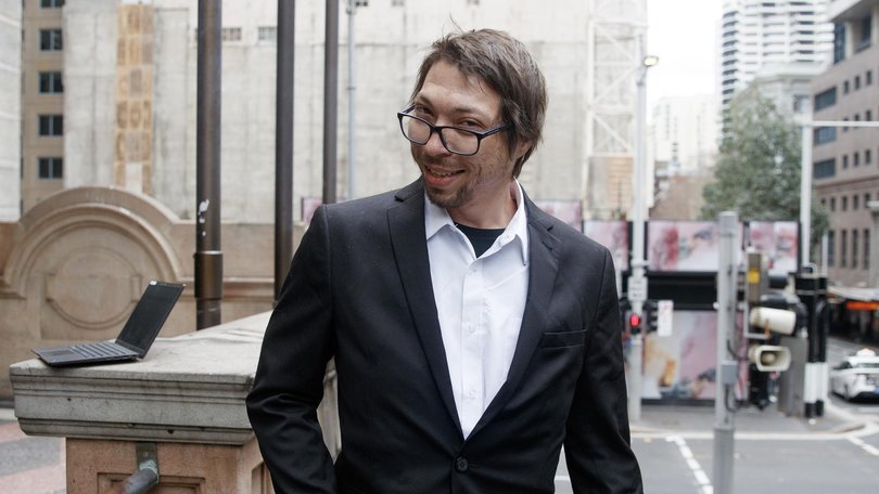 Anthony Mitchell leaves the Downing Centre Court on Friday. NewsWire / Nikki Short