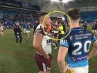 A pitch invader grabbed Daly Cherry-Evans before he was tackled to the ground by security.