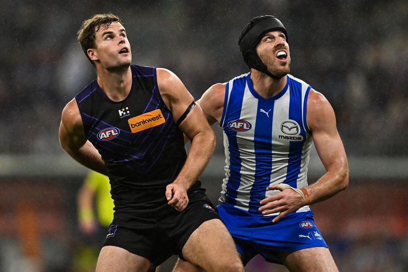PERTH, AUSTRALIA - JUNE 14: Sean Darcy of the Dockers competes in a ruck contest with Tristan Xerri of the Kangaroos during the 2025 AFL Round 14 match between the North Melbourne Kangaroos and the Fremantle Dockers at Optus Stadium on June 14, 2025 in Perth, Australia. (Photo by Daniel Carson/AFL Photos)