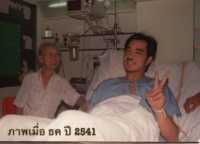 In hospital after the crash in 1998.