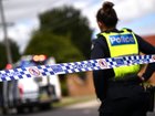 A small Queensland coastal village is devastated after the death of a woman who was allegedly stabbed in her home.