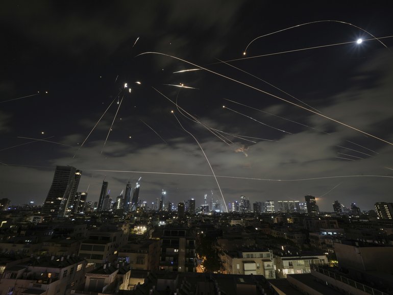 The Israeli Iron Dome air defence system fires to intercept missiles during an Iranian attack over Tel Aviv, Israel, Sunday, June 15, 2025. 