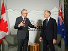 Australian Prime Minister Anthony Albanese speaks with Prime Minister of Canada Mark Carney during a bilateral meeting ahead of the G7 Leaders' Summit in Kananaskis, Alberta.
