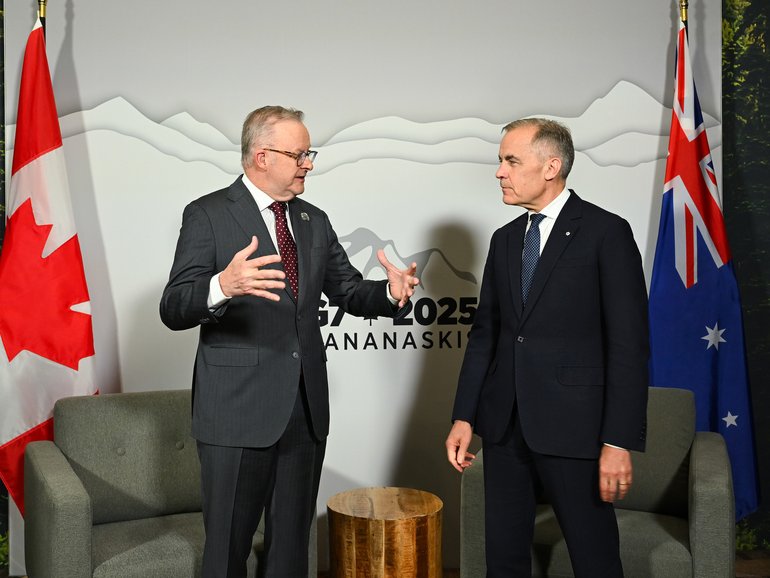 Australian Prime Minister Anthony Albanese speaks with Prime Minister of Canada Mark Carney during a bilateral meeting ahead of the G7 Leaders' Summit in Kananaskis, Alberta.