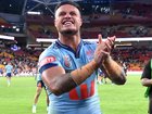 Spencer Leniu celebrates victory after game one of the  State of Origin series.
