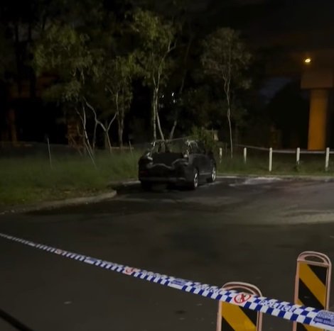 A torched car found in Harris Park.