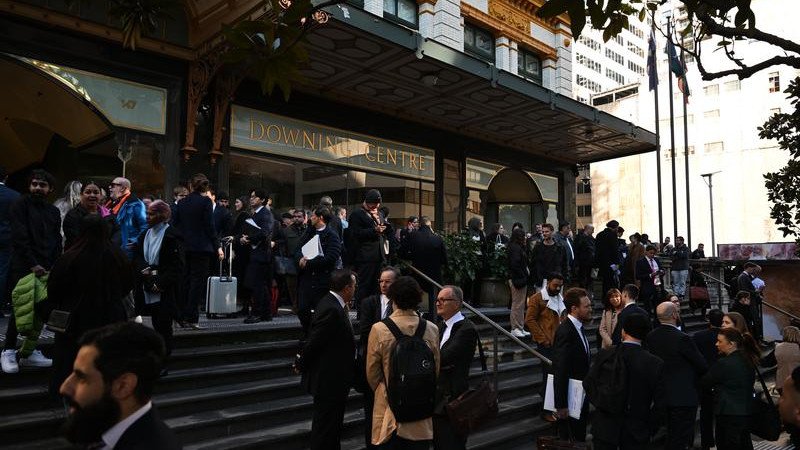 A power outage, caused by a burst pipe, forced the evacuation of a busy city courthouse. (Dean Lewins/AAP PHOTOS)