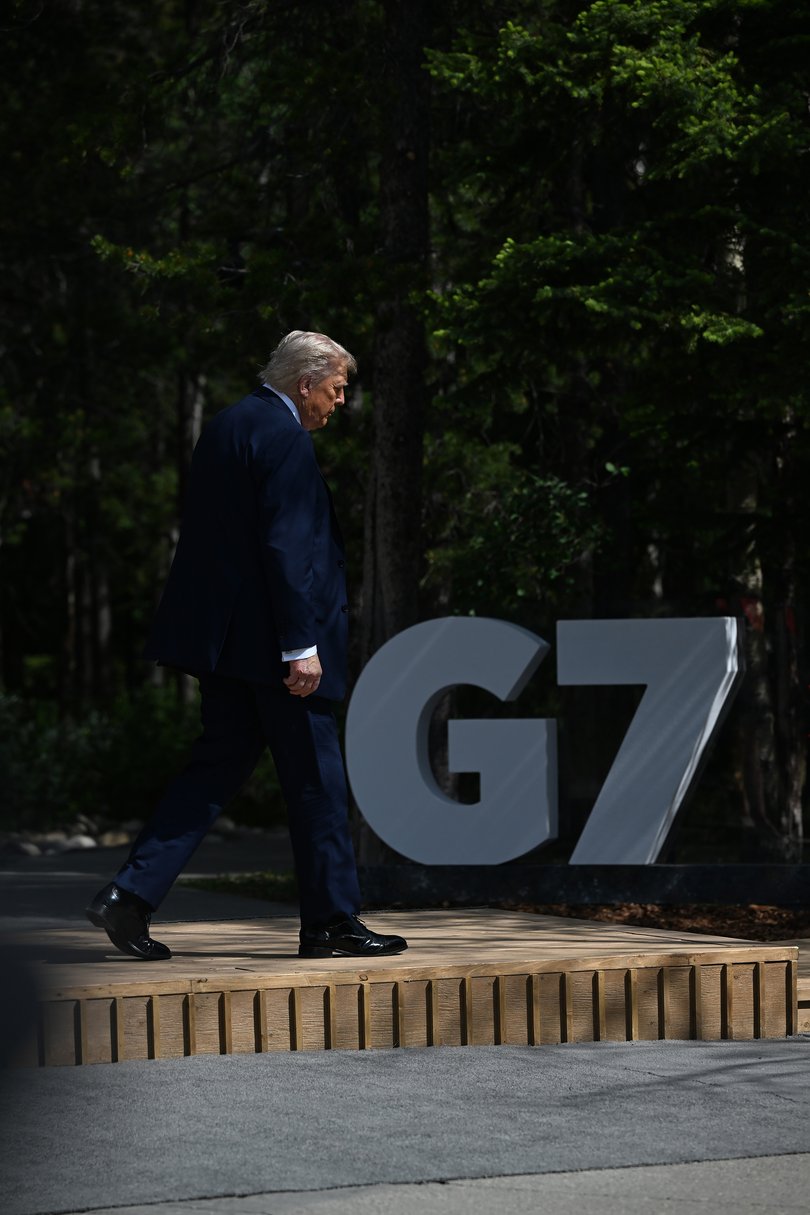 President Donald Trump before leaving the G7 summit.