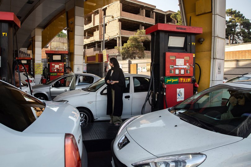 Drivers fill their tanks after waiting in a long line at a gas station in Tehran, Iran, on Monday, June 16, 2025.