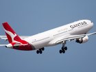 A Qantas pilot passed out in the cabin while at the controls of a passenger jet.