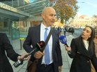 Warren Tredrea faced questions outside court. 